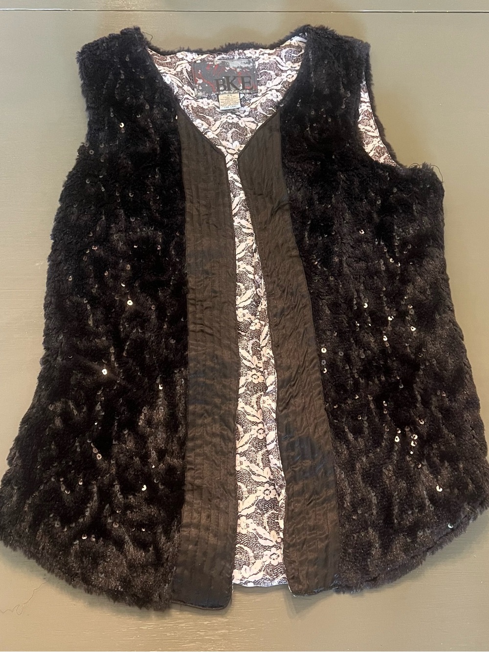 BKE Black Faux Fur Sequin Vest with Patterned Lining